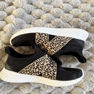 Adidas Puremotion Adapt slip-on sneakers in a black and leopard print colorway